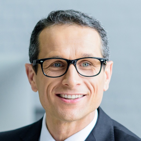 Selective Focus Of Smiling Businessman Talking To 2024 11 19 15 16 15 Utc Cropped